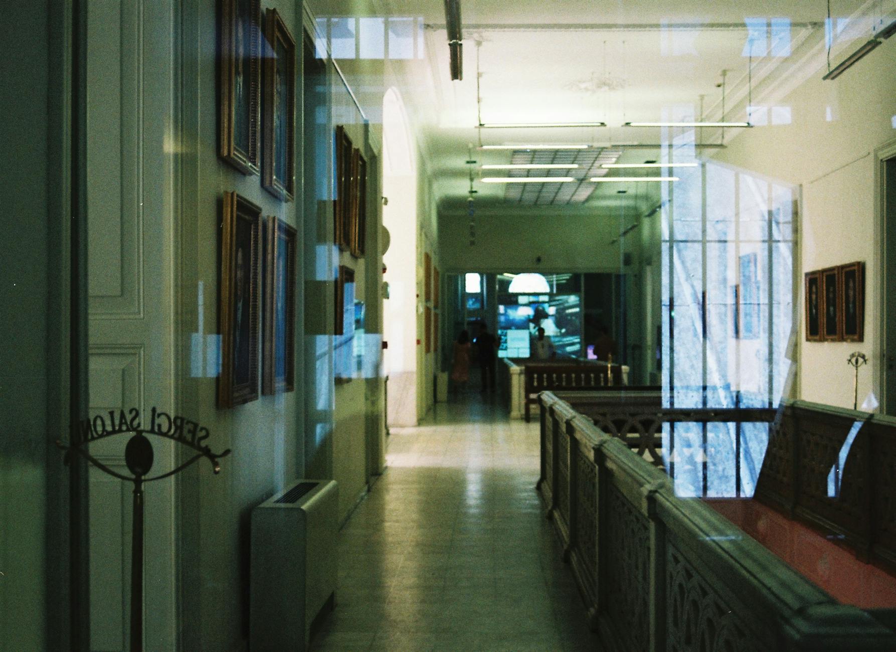 An interior view of a gallery corridor with reflections in İstanbul, Turkey.