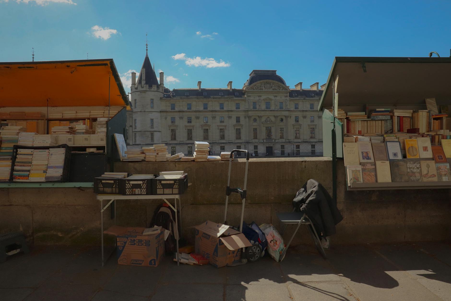 Explore iconic book stalls by the Seine in Paris, capturing the city's literary charm.