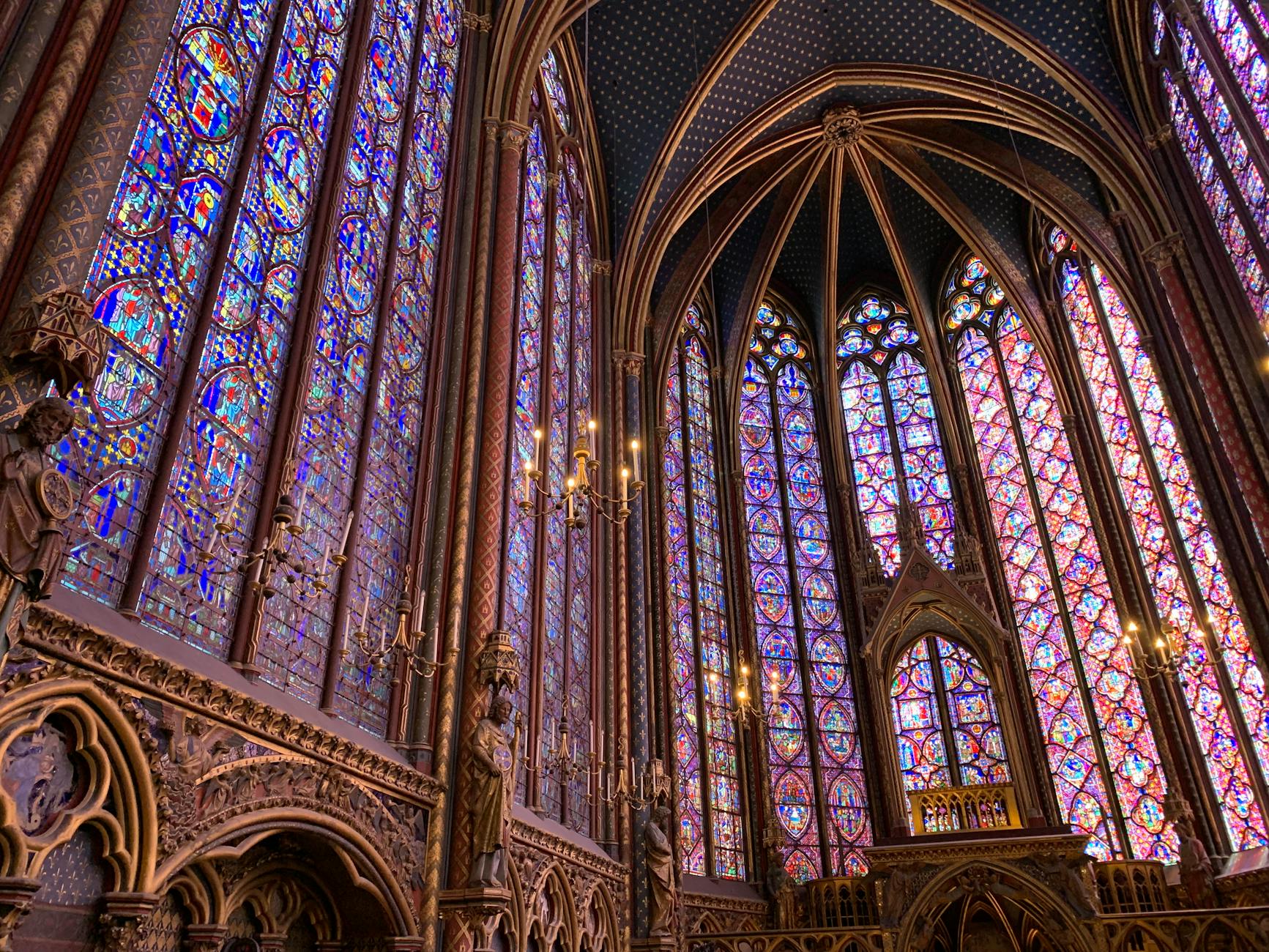 Explore the breathtaking stained glass windows of Sainte-Chapelle in Paris, showcasing exquisite craftsmanship.