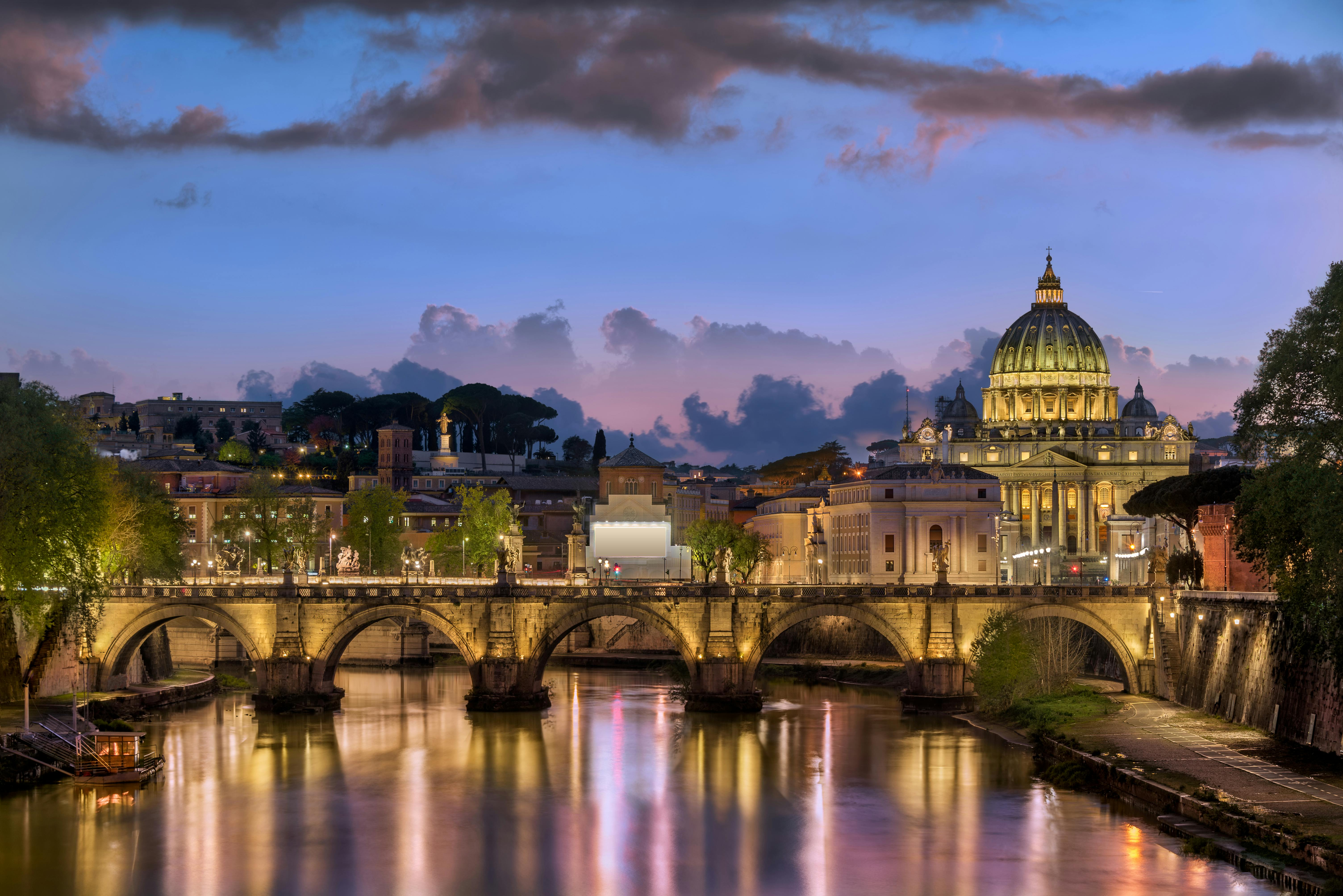 Breathtaking panoramic skyline of Rome at sunset with historic rooftops and domes, Italy - Rome travel planning