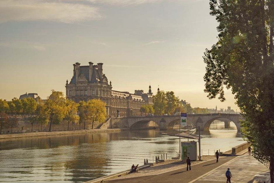 The Louvre and the Seine in warm evening light