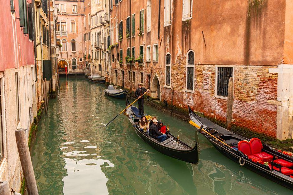 Gondolas on a canal in Venice