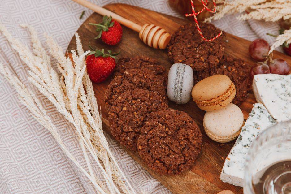 Pastries, fruit and cheese for a picnic