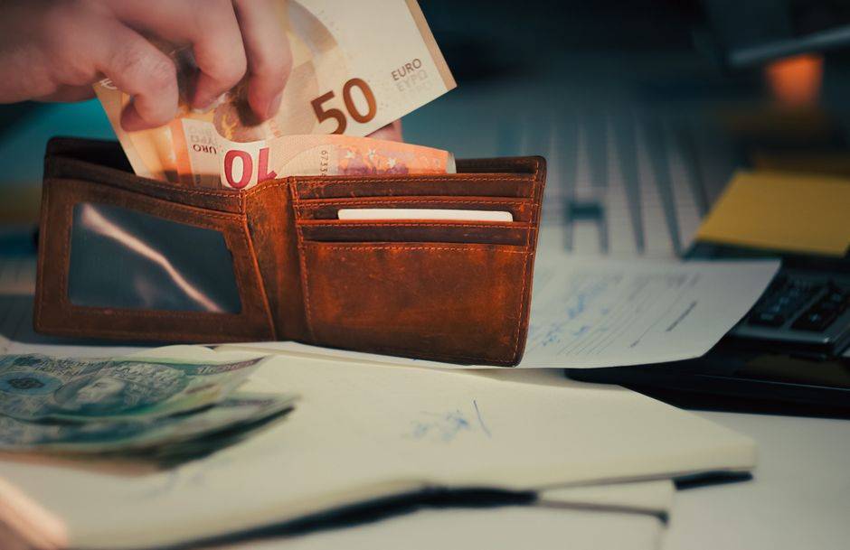 Euro banknotes in a wallet