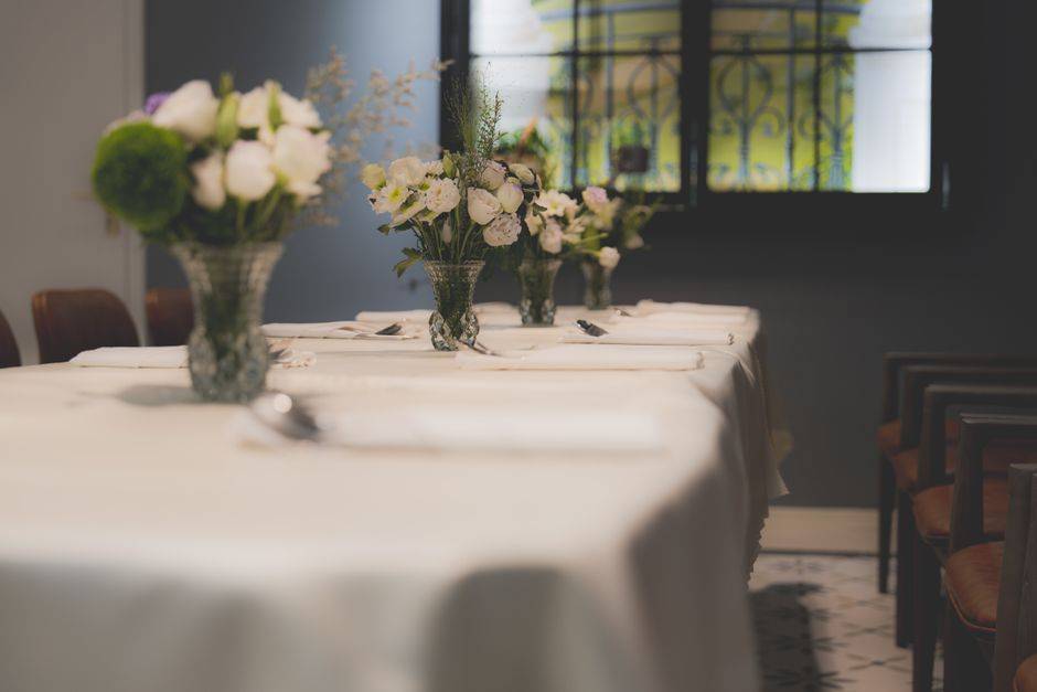 A restaurant table set for dinner