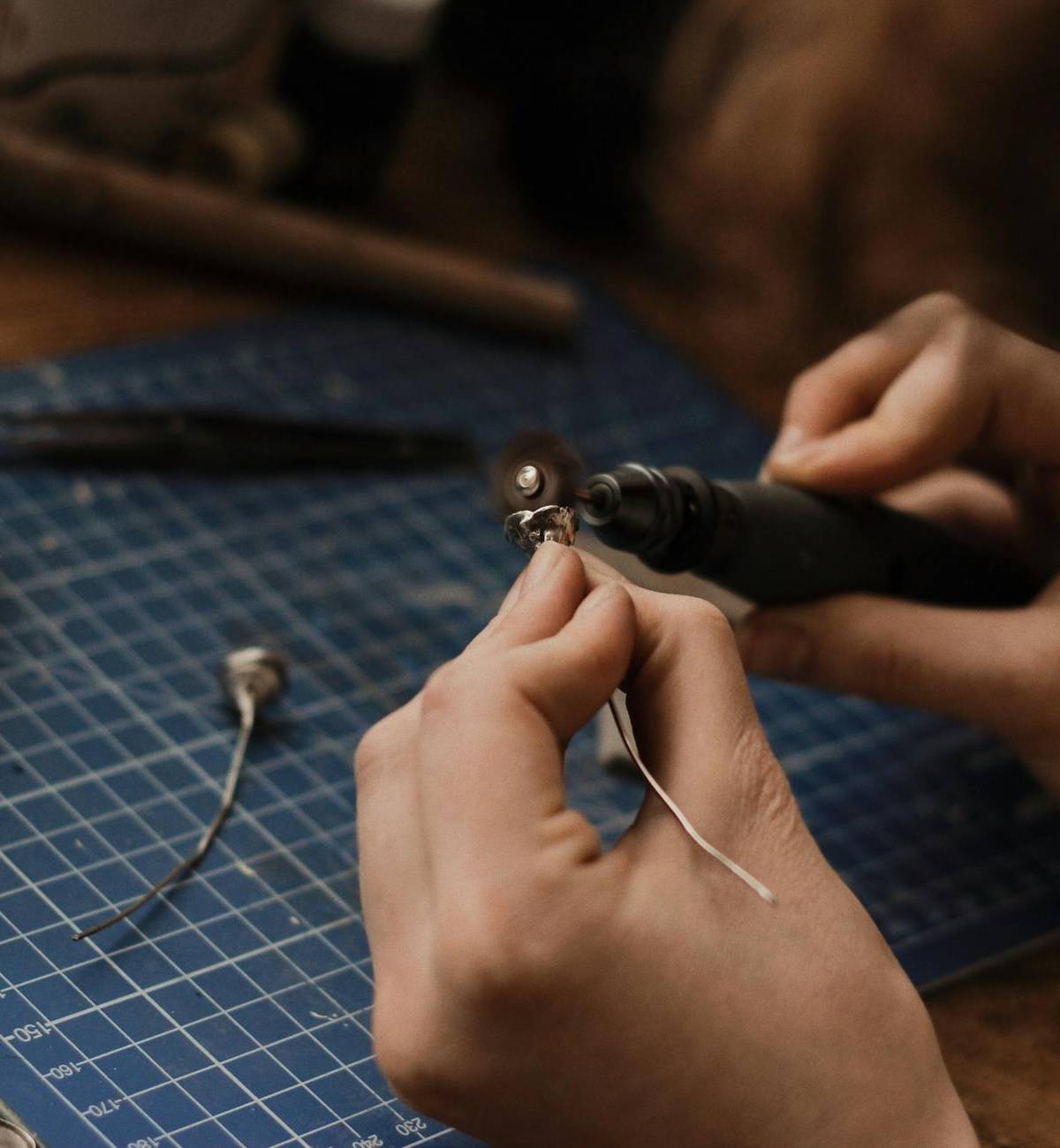 Fine handwork on a piece of jewelry, illustrative photograph