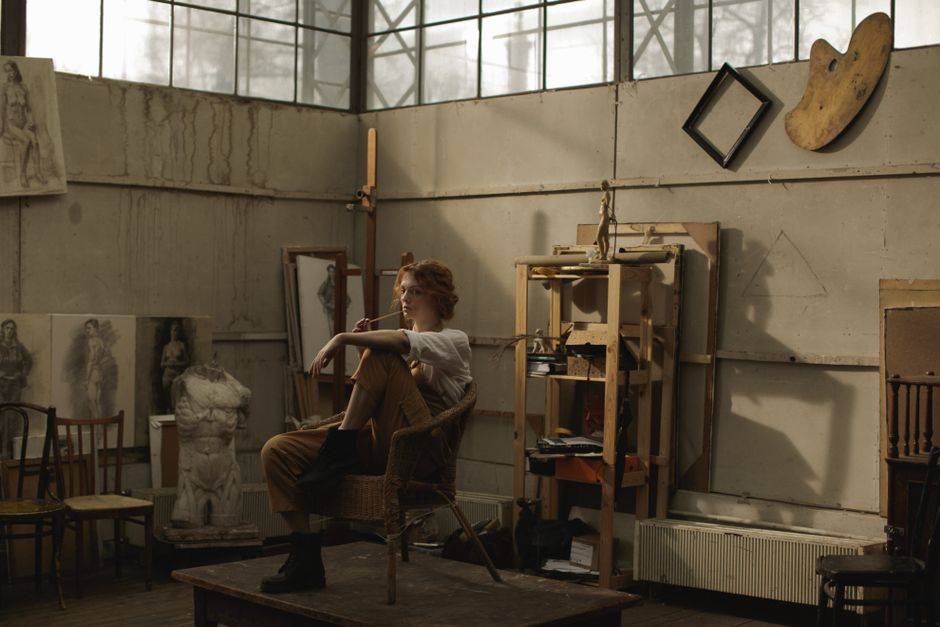 An artist at work in a studio, illustrative photograph