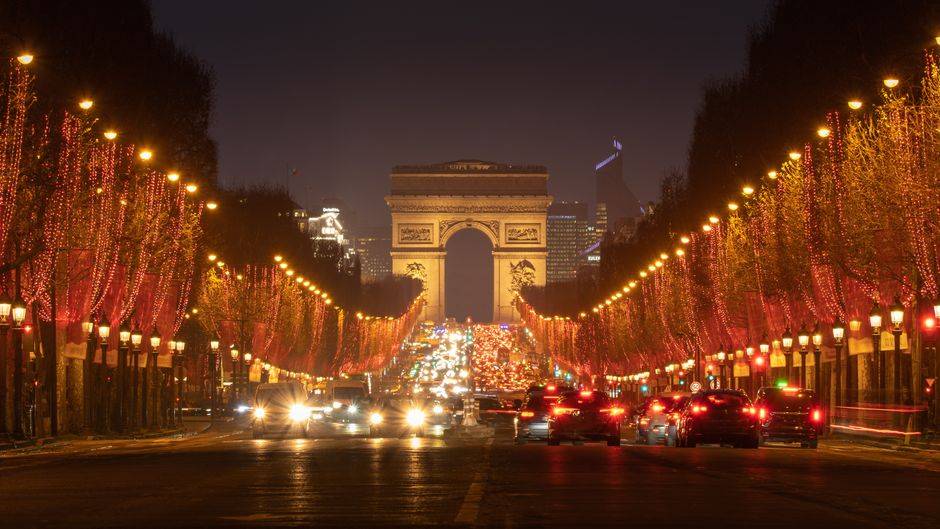 The Champs-Élysées and Arc de Triomphe illuminated at night