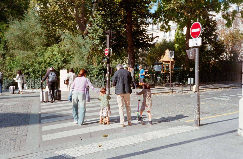A family walking through Paris