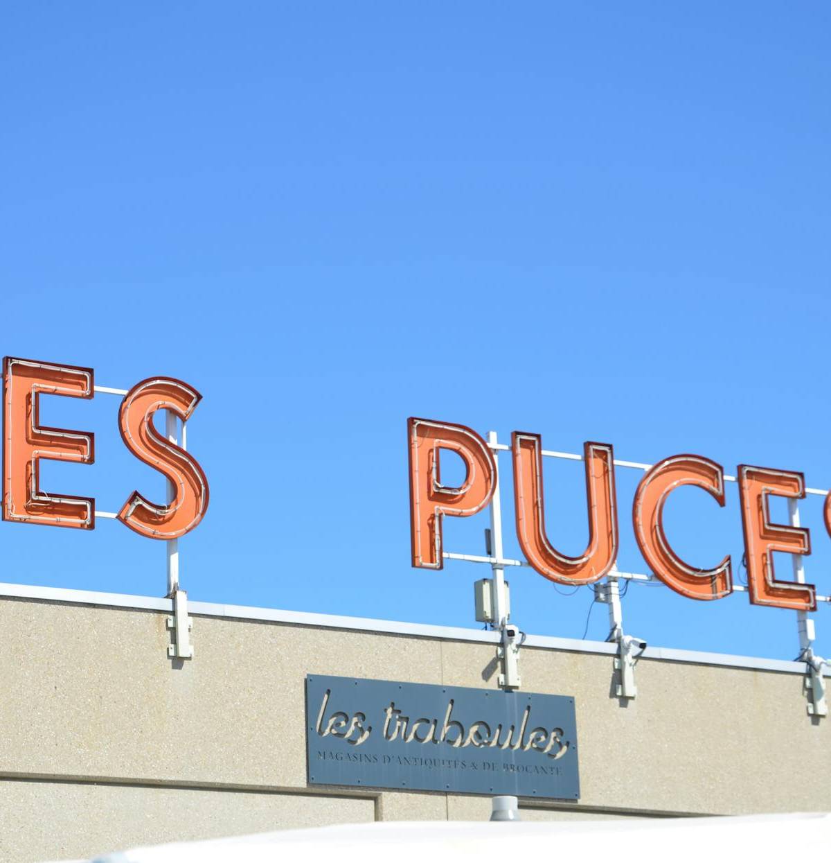 The Les Puces sign at the Paris flea markets